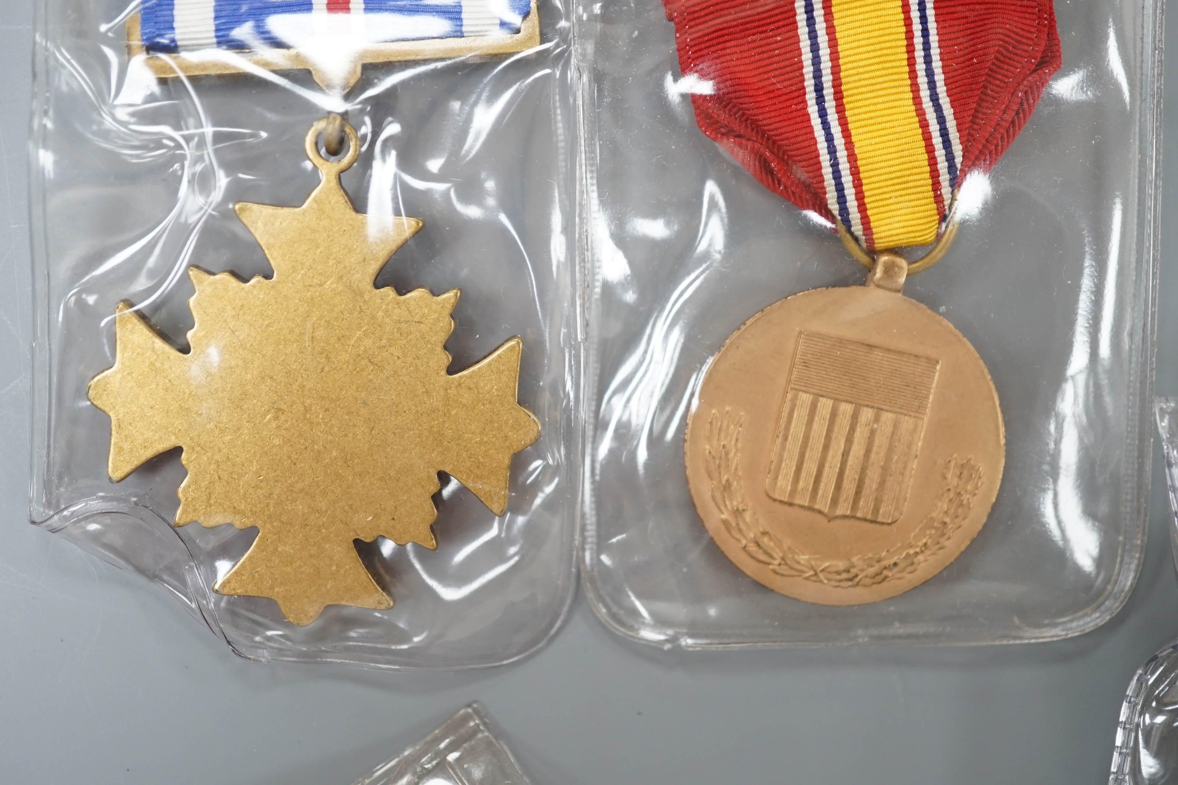 Four U.S. forces unnamed military medals to include
